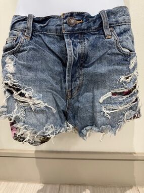 Free People Distressed Blue Denim Cutoff Shorts with Frayed Hem